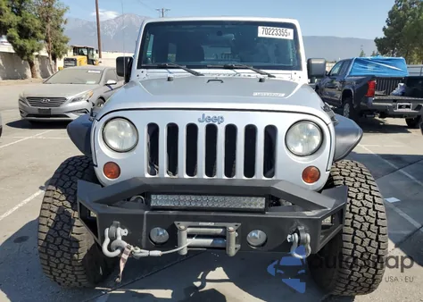 2011 Jeep Wrangler Unlimited Sahara из США, поврежденный, VIN 1J4BA5H16BL521963